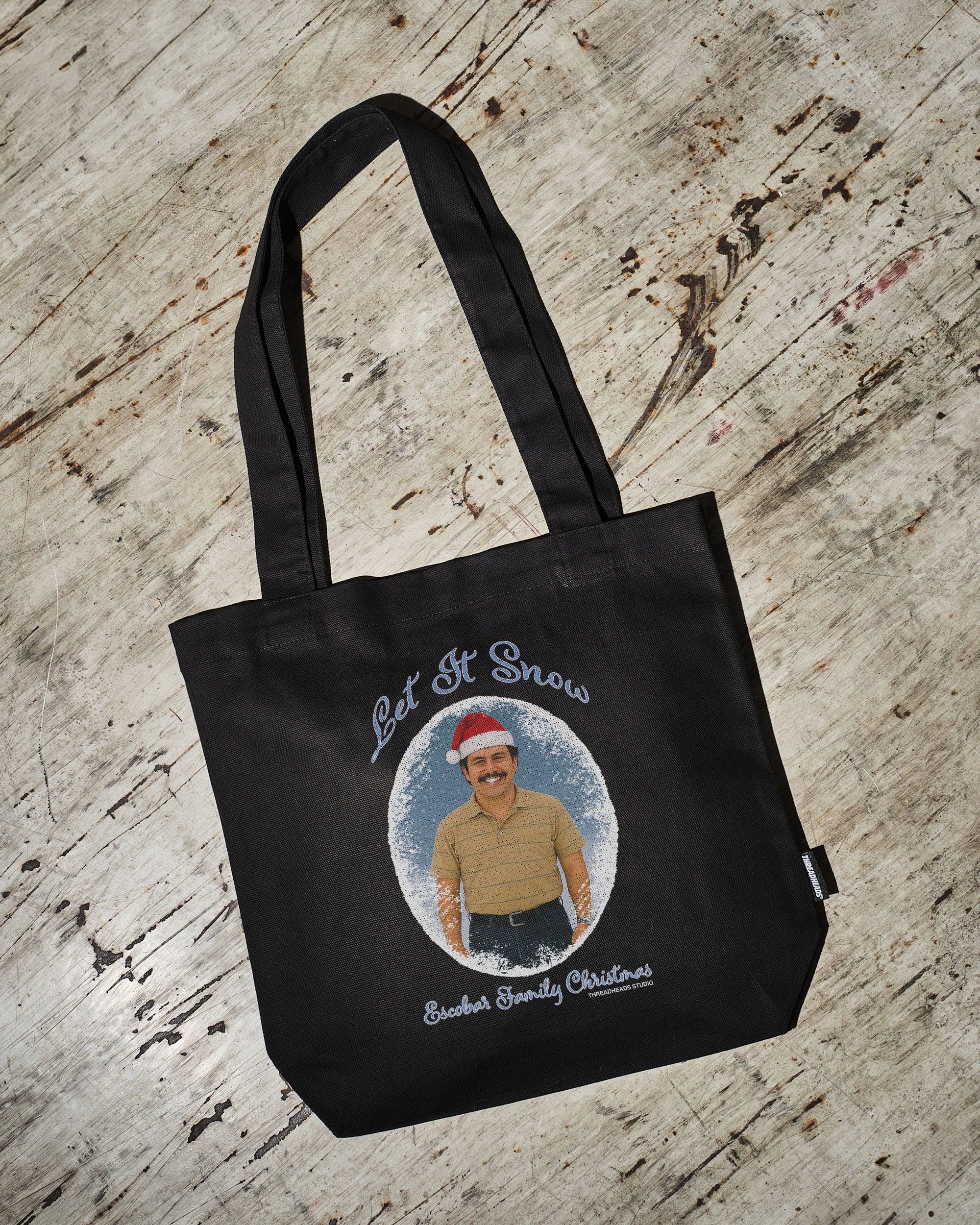 Let It Snow Pablo Black Tote Bag